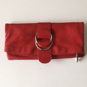 Leather clutch (moderately used)
